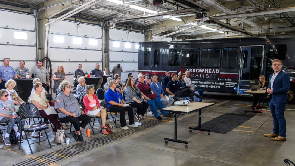 Attendees listening to an presentation at the Arrowhead Transit RideAmart 2025 launch event.