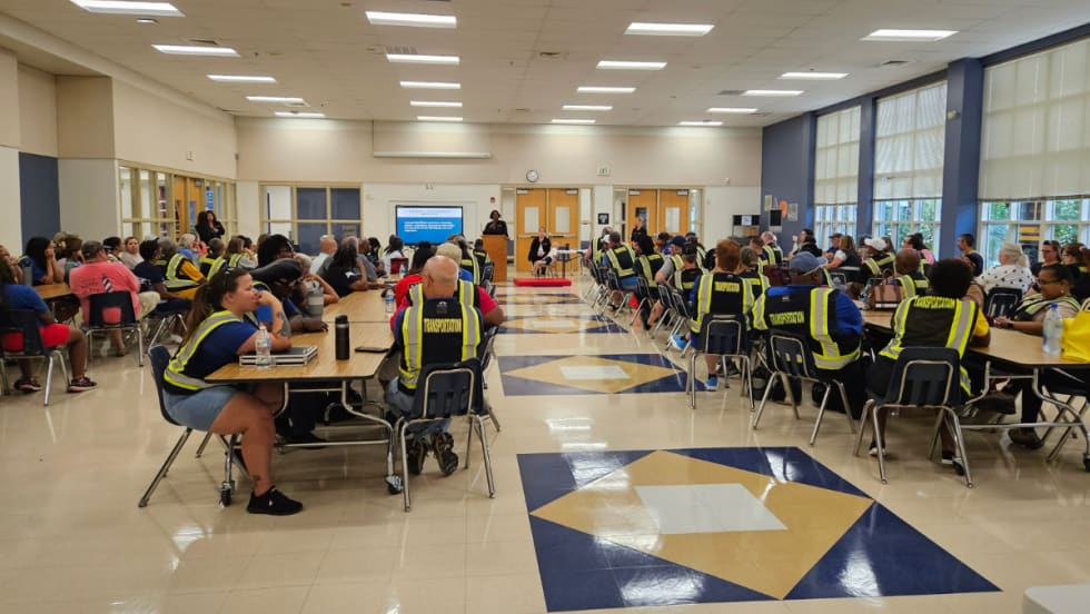 A classroom full of school bus drivers during a training day.