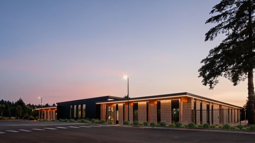 Exterior image of C-TRAN's campus expansion during sunrise.