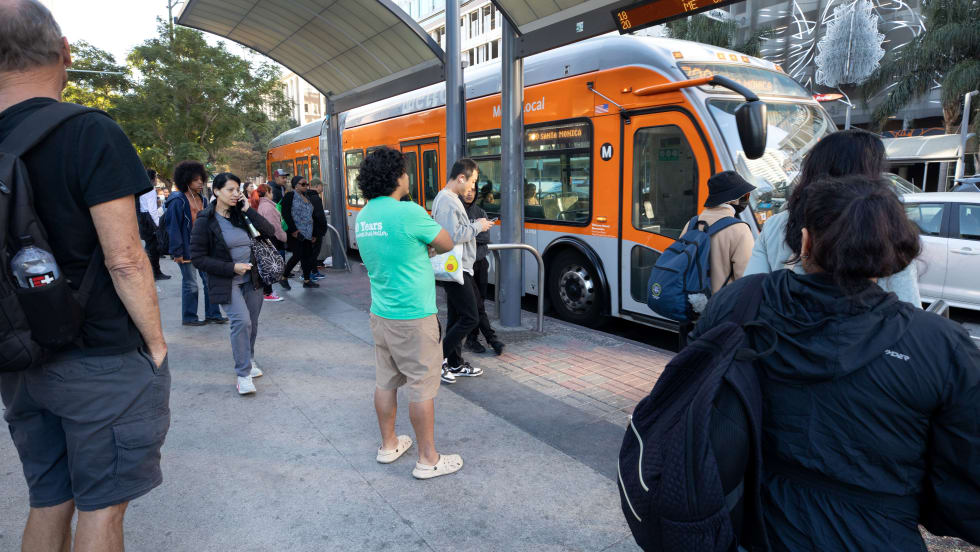 Passengers preparing to board LA Metro Bus