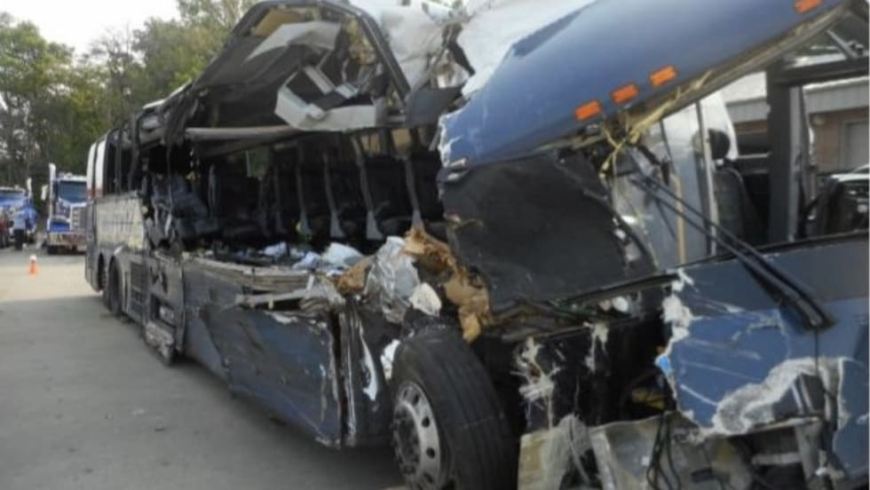 Post-crash photo of the Greyhound motorcoach.