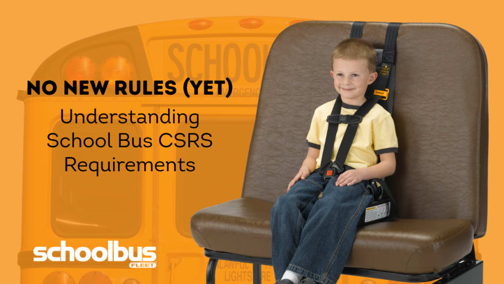 Young child secured in a child restraint system on a school bus seat, highlighting school bus CSRS requirements.