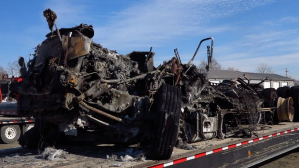 Remains of burned-up Freightliner tractor-trailer