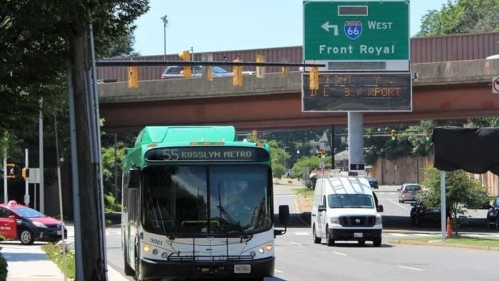 NVTC Bus driving down the street