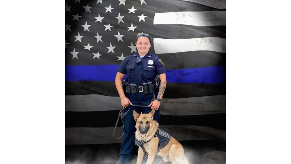 Fallen Richmond, IN, police officer Seara Burton with K-9 partner Brev. The dog has been retired. (Photo: Richmond PD)[|CREDIT|]