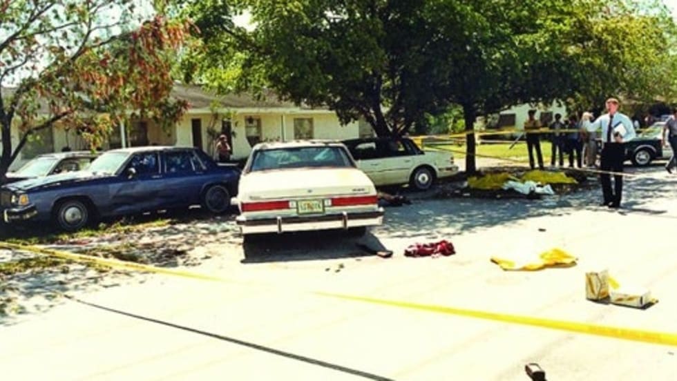 Crime scene photo of the infamous FBI Miami shootout, showing suspect and agents' vehicles and battle debris. Photo: Miami-Dade PD.