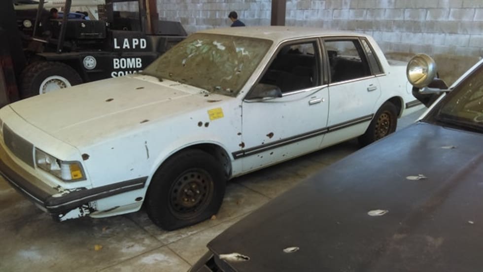 Matasareanu tried to get away in this Chevrolet Celebrity. LAPD officers shot out the front tires, foiling his escape. Photo: Los Angeles Police Museum/David Fryar