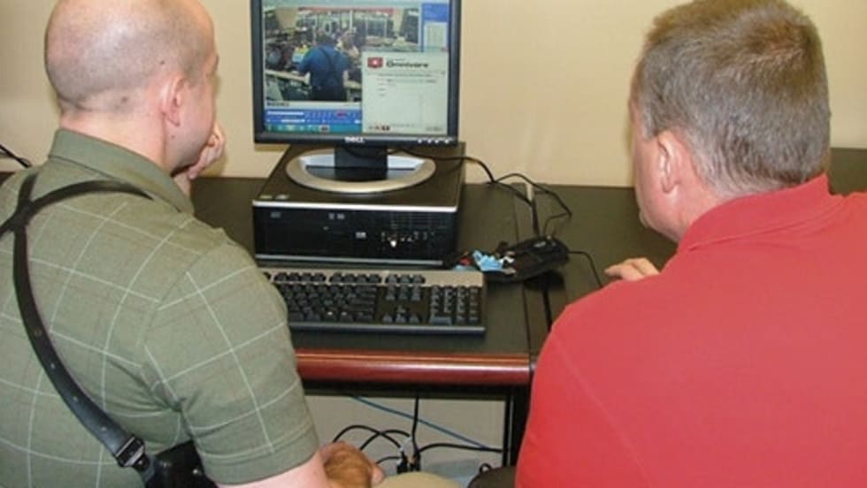PHOTO: Ocean Systems. Fort Wayne detectives upload a file using Ocean Systems' solution for video analysis.