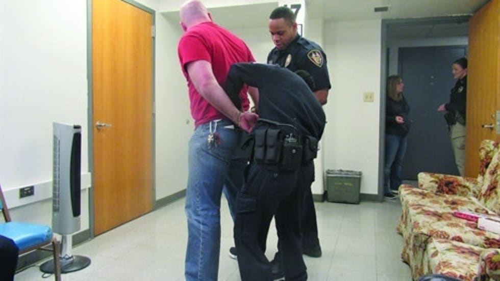 Arrestees are less likely to resist if they know they are outnumbered. (Photo: Michael Schlosser)