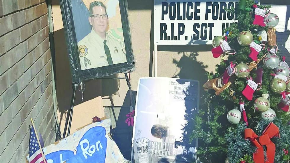 A memorial to Sgt. Ron Helus at the Borderline Bar and Grill. [|CREDIT|]Photo: Lynn Hamilton
