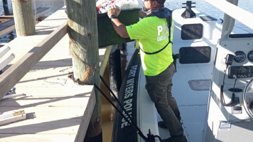 The Marine Unit from the Fort Myers Police Department delivers supplies to people on Pine Island.[|CREDIT|]PHOTO: Fort Myers Police Department