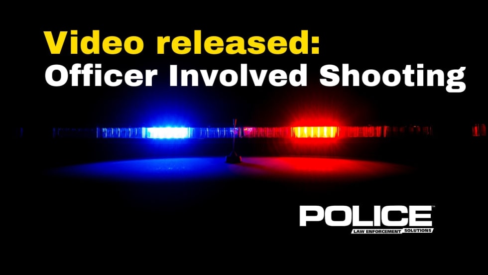 Police emergency lights with text about officer-involved shooting incident