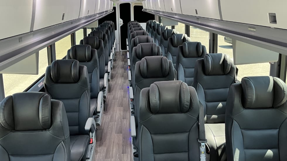 Interior of a MCI J4500 bus with 2+1 executive seating.