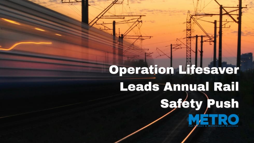 A train passing by during sunset.