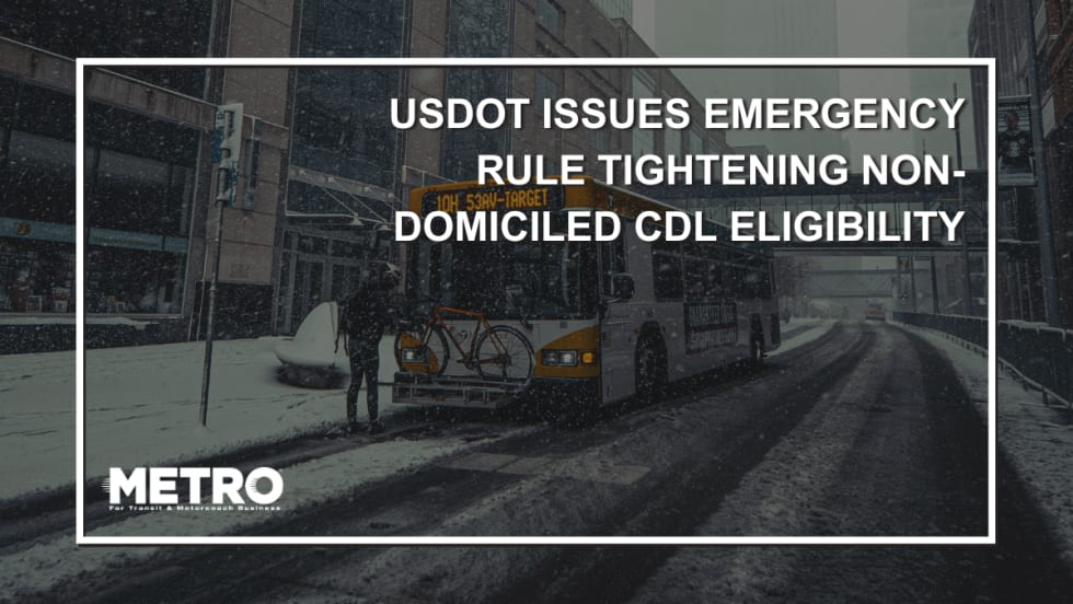 A graphic with an image of a public transit bus on a snowy city road and text reading "USDOT Issues Emergency Rule Tightening Non-Domiciled CDL Eligibility."