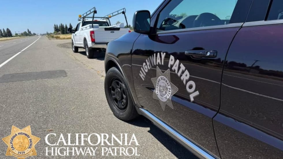 New CHP patrol vehicle pulling over a car. 