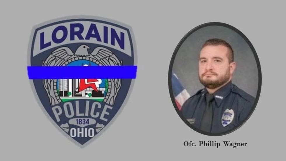 Lorain Police Department official badge and officer portrait with blue thin line emblem