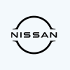 Black and white Nissan logo featuring the brand name inside a circular emblem with cutouts at the top and bottom.