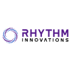 Logo for Rhythm Innovations featuring a circular graphic of blue and purple dots and the text "RHYTHM INNOVATIONS" in purple sans-serif font.