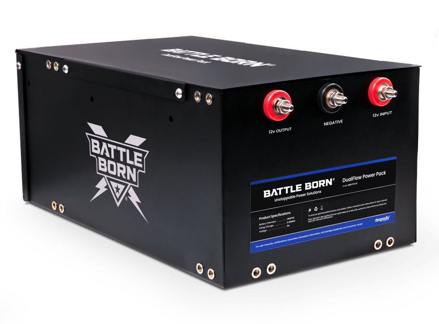 A Battle Born DualFlow Power Pack with a black metal casing featuring the Battle Born logo. The unit has labeled terminals for 12V output, negative, and 12V input, along with a product specification label on the front.