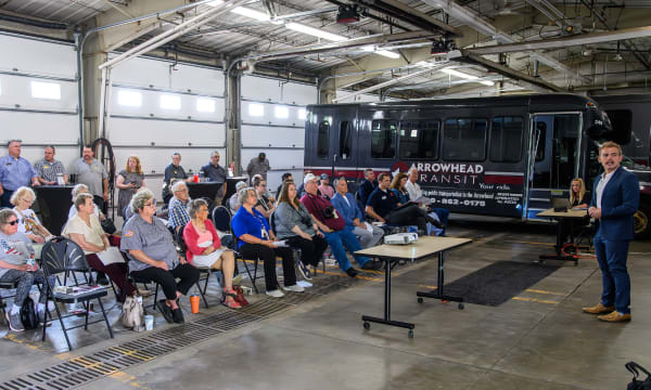 Attendees listening to an presentation at the Arrowhead Transit RideAmart 2025 launch event.
