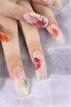 Nails have to be rather lengthy for the postage stamp art to work; consider scanning the stamps in and shrinking them to create a more everyday design.