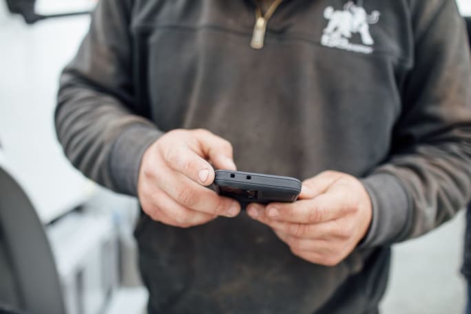 A driver using a cell phone