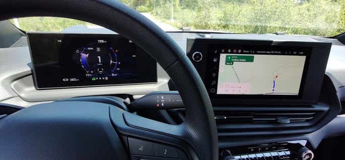 Driver's view of the dashboard with two displays.