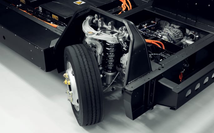 Overhead view of a truck chassis and wheel.