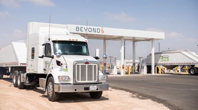 White tractor-trailer at Beyond6 renewable natural gas fueling station
