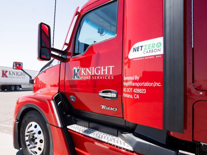 Red Knight tractor operating on near-net-zero renewable natural gas fuel
