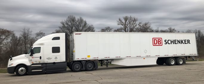 White tractor-trailer with DB Schenker logo