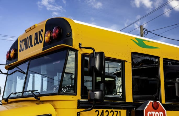 Close up of front of school bus and roof