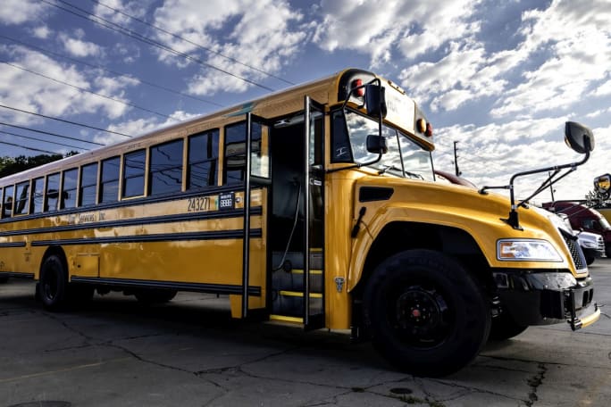 Front three quarter view of school bux