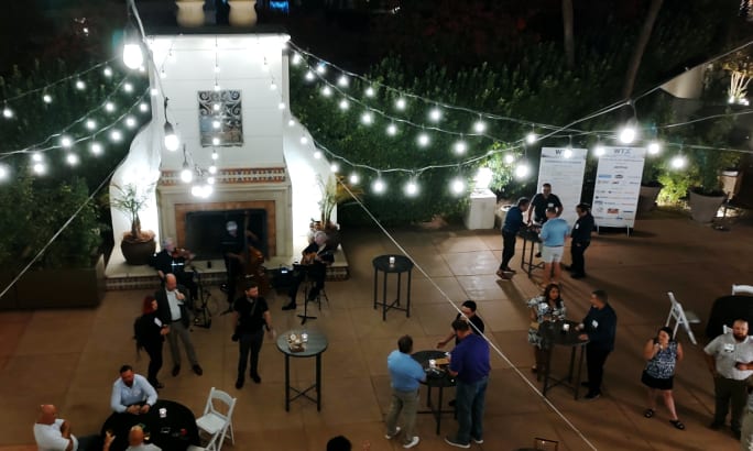 Overhead view of a night social event.