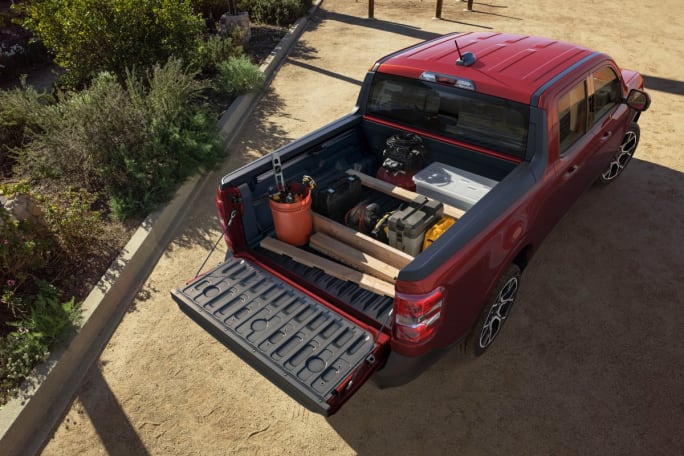 Aerial view of the bed of a red 2025 Ford Maverick pickup truck.