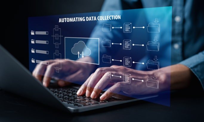 Automated data collection hands at a laptop