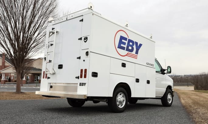 white enclosed service body truck