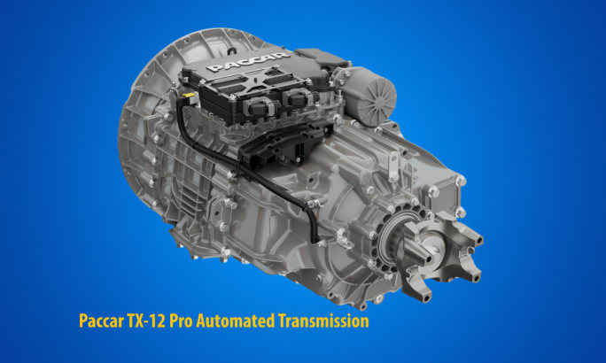 Photo of a transmission against a blue background and test stating: Paccar TX-12 Pro.