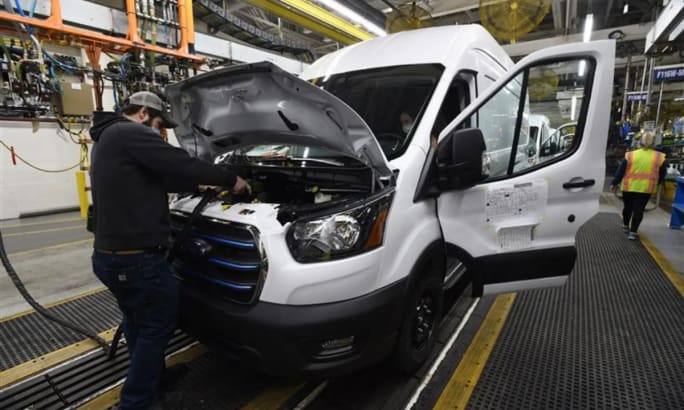Ford worker builds a new Ford E-Transit van at Kansas City Assembly Plant, celebrating the 1.5 millionth Transit built in the U.S.
