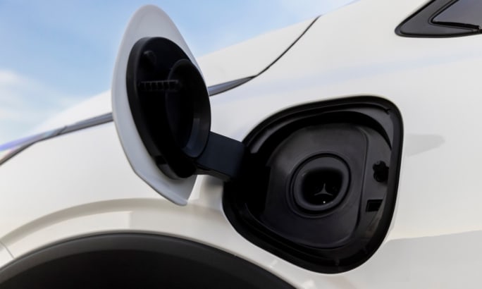 Side profile of the Chevrolet Bolt EV highlighting its compact hatchback design.