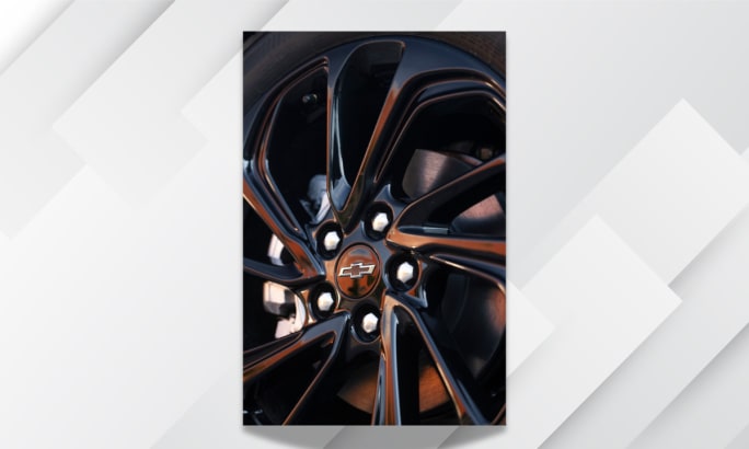 Close-up of the new NACS charging port on the 2027 Chevrolet Bolt EV.