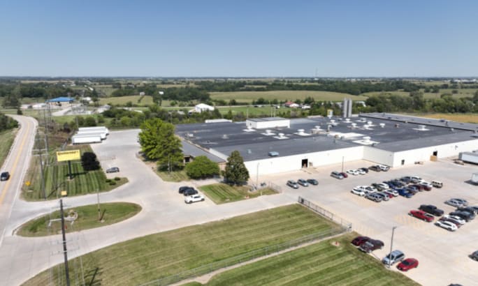 Aerial view of Continental’s ContiTech manufacturing facility in Mount Pleasant, Iowa, showing the existing plant and surrounding parking areas.