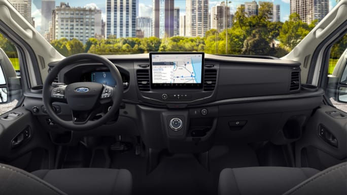Interior view of the 2026 Ford Transit showing the new 12 inch SYNC 4 touchscreen, digital cluster and updated controls that add more connectivity and in cab tech for fleet drivers.