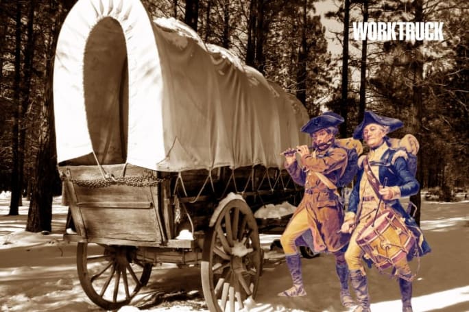 Sepia image of a covered wagon with two Revolutionary-era musicians, symbolizing early American transport and the roots of modern fleet work.