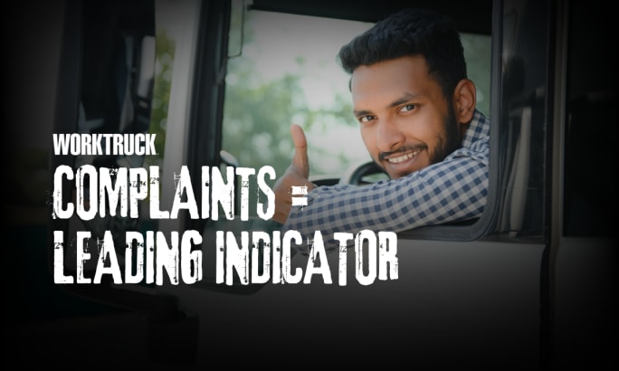 Work truck driver giving a thumbs-up from the cab, representing how driver complaints can serve as early indicators of fleet safety risks.