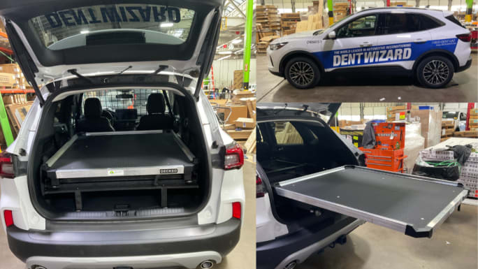 White Dent Wizard SUV with rear cargo platform system extended, showing organized equipment storage designed for field service and mobile work.