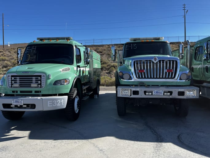 Collection of fleet disaster response scenes including fire trucks, staging camps, equipment transport, and field operations showing real-world readiness in action