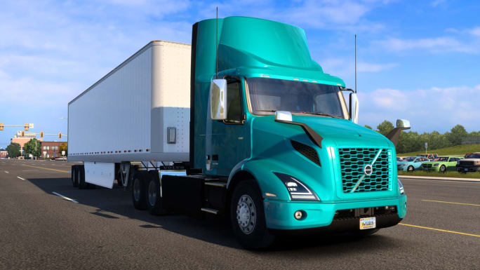 A teal Volvo VNR Electric tractor hauling a white box trailer in American Truck Simulator.