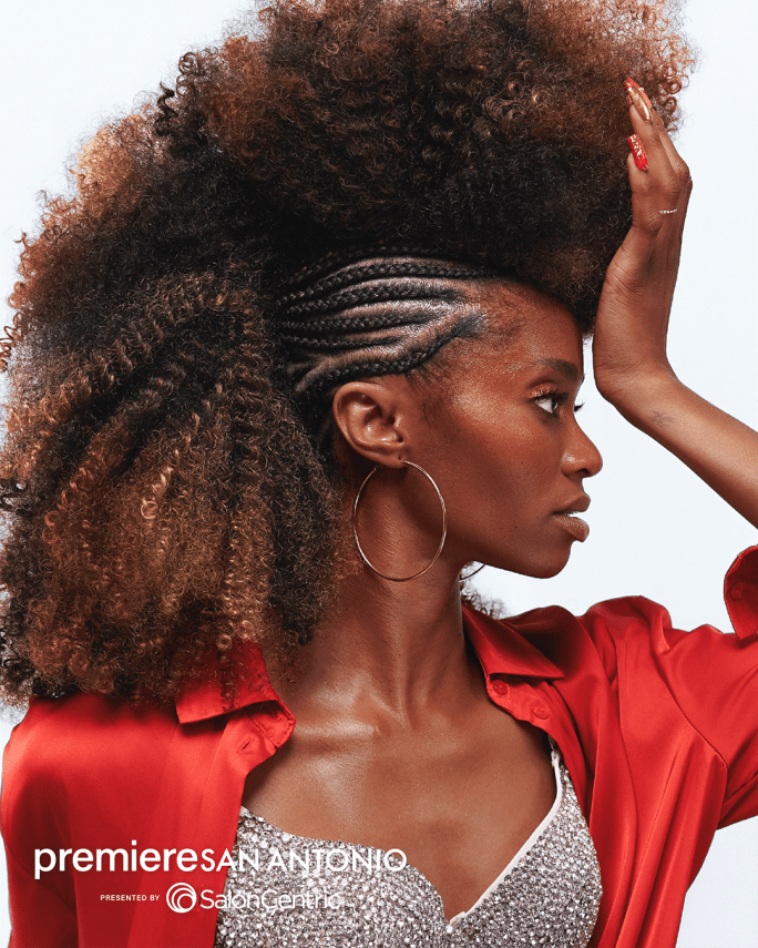 woman with an afro mohawk hairstyle, braided on the sides